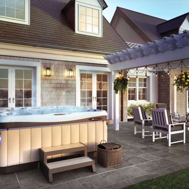 Caldera salt water hot tub in backyard