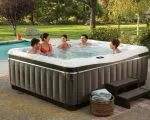 Thumnbail of Five people enjoying Caldera's Utopia hot tub spa
