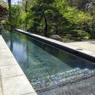 Swimming pool with colourful mosaic steps