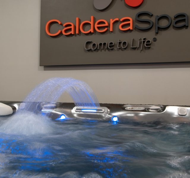 caldera spa with water jet feature on display