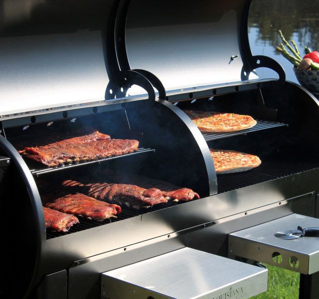 Meat and pizza on pellet grill