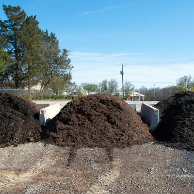 Three piles of mulch