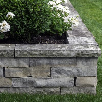 Gray natural stone retaining wall